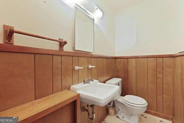 2317 Ga Highway 24, Statesboro, GA 30461 - half bathroom featuring wainscoting and tile patterned flooring
