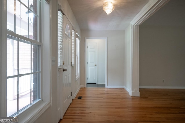 2021 Windfield Dr, Monroe, GA 30655 - entrance foyer featuring light wood-style floors and baseboards