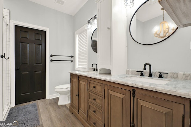 92 Autumn Path, Rockmart, GA 30153 - full bathroom with wood finished floors, double vanity, a chandelier, and an enclosed shower