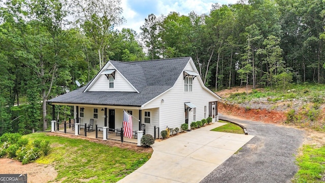 92 Autumn Path, Rockmart, GA 30153 - view of front of property featuring covered porch, roof with shingles, and concrete driveway
