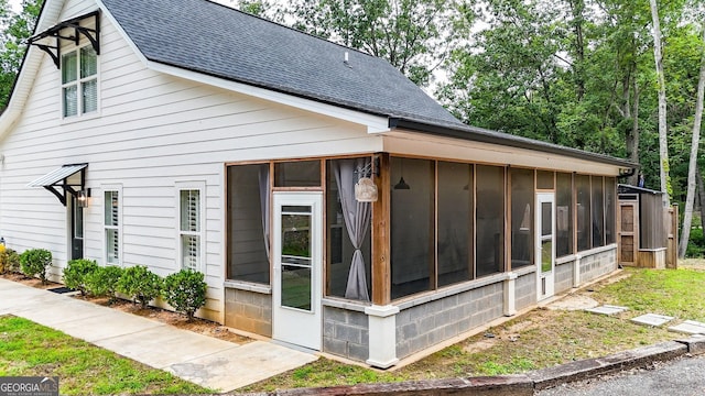 92 Autumn Path, Rockmart, GA 30153 - view of home's exterior featuring a shingled roof and a sunroom