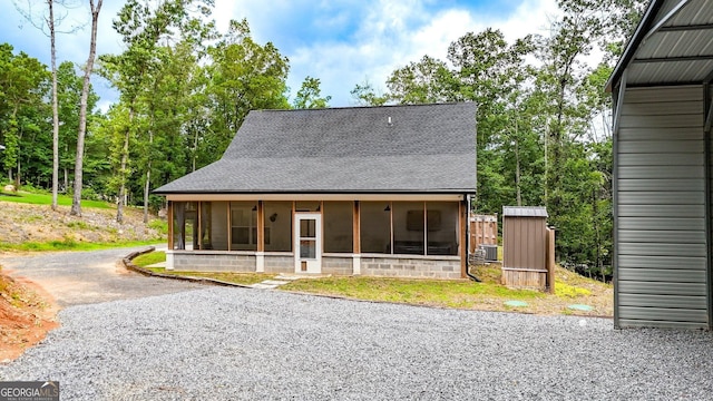 92 Autumn Path, Rockmart, GA 30153 - view of front of house featuring a sunroom and a shingled roof