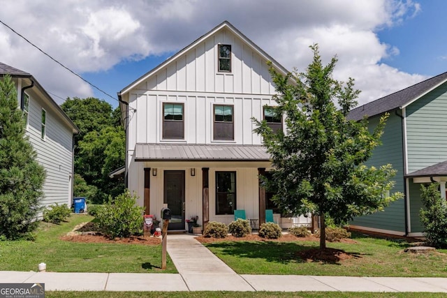 230 Lake St, Athens, GA 30601 - modern farmhouse featuring board and batten siding, a porch, and a front lawn