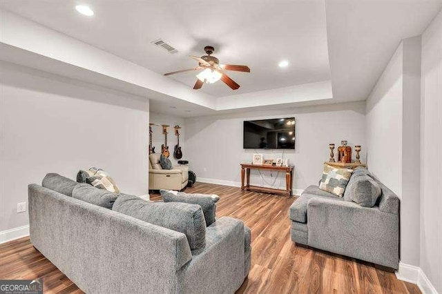 125 Shamus Way, Jefferson, GA 30549 - living area featuring a tray ceiling, a ceiling fan, wood finished floors, and recessed lighting