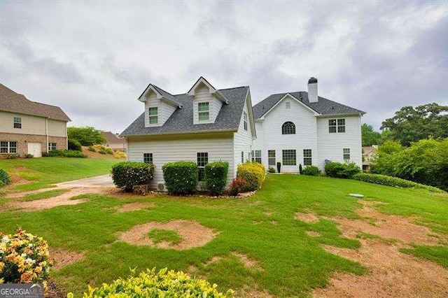 125 Shamus Way, Jefferson, GA 30549 - rear view of property with a lawn and a chimney