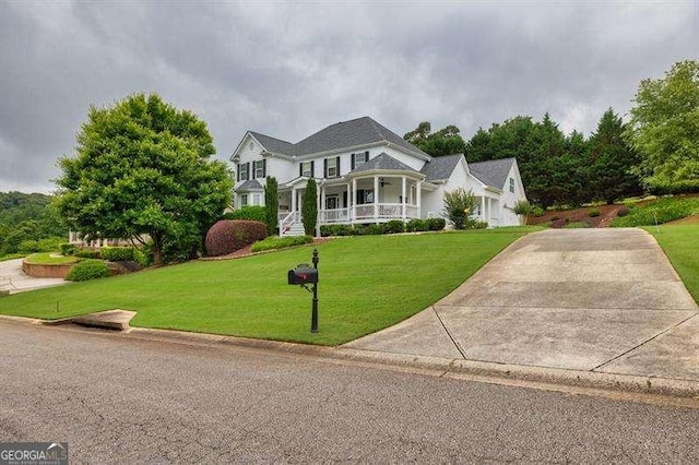 125 Shamus Way, Jefferson, GA 30549 - view of front of house featuring covered porch and a front lawn