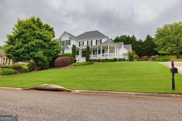 125 Shamus Way, Jefferson, GA 30549 - view of front of home with covered porch and a front lawn