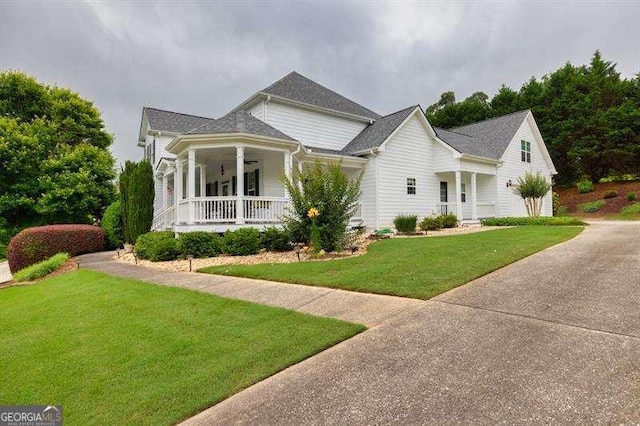125 Shamus Way, Jefferson, GA 30549 - view of front of house with covered porch, a front yard, and concrete driveway