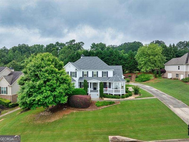 125 Shamus Way, Jefferson, GA 30549 - colonial house with covered porch and a front yard