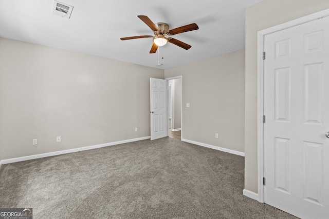 1179 Chatham Rd, Buford, GA 30518 - unfurnished bedroom with carpet floors and a ceiling fan