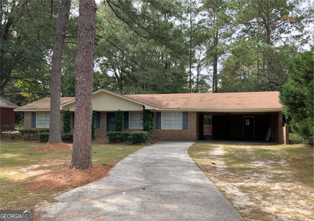 216 Henderson St, Statesboro, GA 30458 - single story home featuring driveway, an attached carport, and brick siding