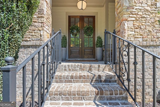 3111 Old Thompson Mill Rd, Buford, GA 30519 - view of exterior entry featuring french doors