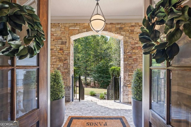 3111 Old Thompson Mill Rd, Buford, GA 30519 - doorway to outside with ornamental molding