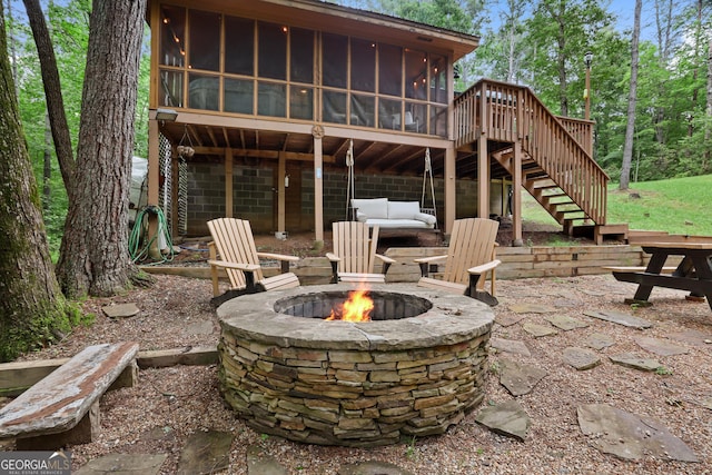 242 Eagles Nest Rd, Sautee Nacoochee, GA 30571 - view of patio featuring an outdoor fire pit, a sunroom, stairs, and a deck