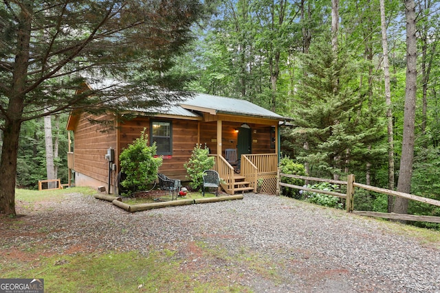 242 Eagles Nest Rd, Sautee Nacoochee, GA 30571 - chalet / cabin featuring a porch and metal roof