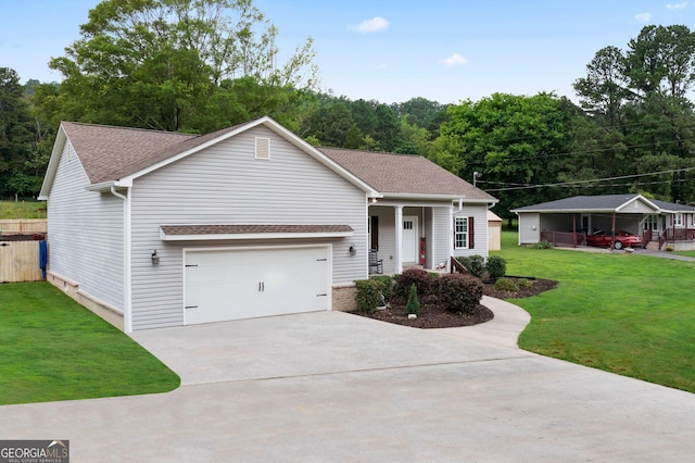 521 Peeples Valley Rd NW, Cartersville, GA 30121 - view of front of house featuring concrete driveway, a front yard, a shingled roof, and a garage
