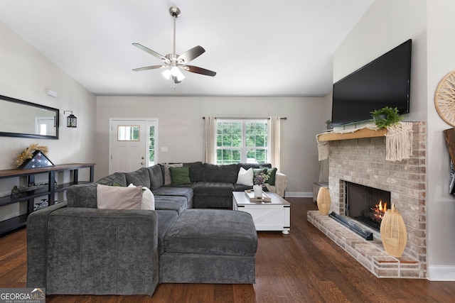 521 Peeples Valley Rd NW, Cartersville, GA 30121 - living room with a brick fireplace, a ceiling fan, dark wood-type flooring, and lofted ceiling