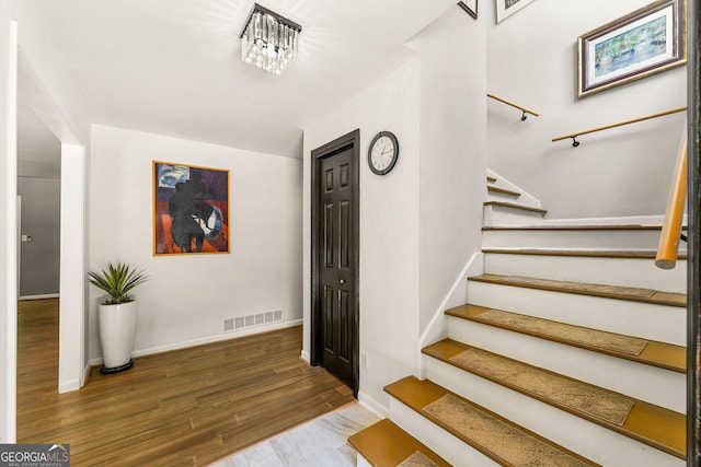 4290 Inverness Ct NE, Roswell, GA 30075 - stairway featuring wood finished floors and baseboards