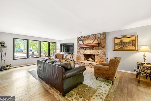 4290 Inverness Ct NE, Roswell, GA 30075 - living area featuring wood finished floors and a fireplace