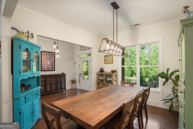 1069 Dean Hill Rd, Monroe, GA 30655 - dining room featuring crown molding and dark wood-type flooring