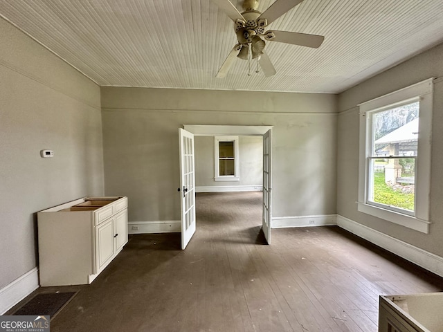 310 Butler St, Waycross, GA 31501 - empty room featuring french doors, ceiling fan, and hardwood / wood-style floors