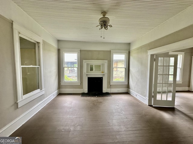 310 Butler St, Waycross, GA 31501 - unfurnished living room featuring plenty of natural light and hardwood / wood-style floors