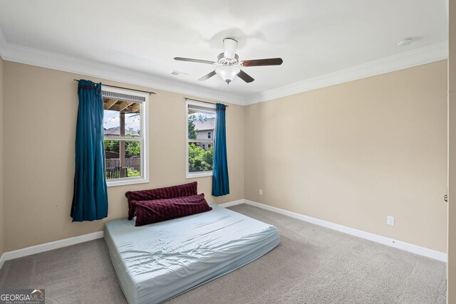745 Newfield Ln, Alpharetta, GA 30004 - carpeted bedroom featuring crown molding and a ceiling fan