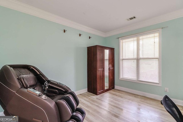 95 Jeffco Dr, Jefferson, GA 30549 - sitting room featuring crown molding and light wood-style flooring