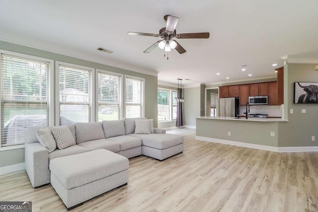 95 Jeffco Dr, Jefferson, GA 30549 - living room featuring crown molding, a ceiling fan, light wood-style floors, baseboards, and recessed lighting