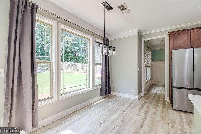 95 Jeffco Dr, Jefferson, GA 30549 - unfurnished dining area with crown molding and light wood finished floors