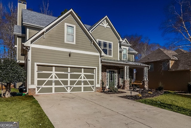 95 Jeffco Dr, Jefferson, GA 30549 - craftsman house with covered porch, a garage, driveway, a front yard, and a chimney