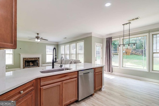 95 Jeffco Dr, Jefferson, GA 30549 - kitchen featuring stainless steel dishwasher, light countertops, open floor plan, a premium fireplace, and ornamental molding