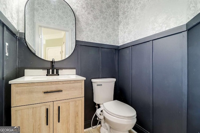 95 Jeffco Dr, Jefferson, GA 30549 - bathroom with wallpapered walls, wainscoting, vanity, and a decorative wall