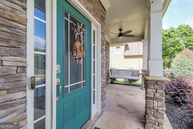 95 Jeffco Dr, Jefferson, GA 30549 - property entrance featuring a ceiling fan and covered porch