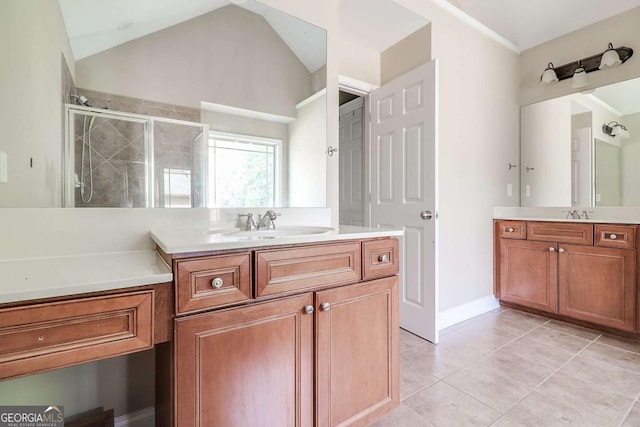 95 Jeffco Dr, Jefferson, GA 30549 - bathroom with a stall shower, two vanities, tile patterned floors, and lofted ceiling