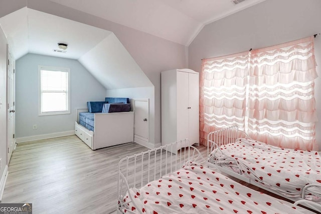 95 Jeffco Dr, Jefferson, GA 30549 - bedroom featuring vaulted ceiling and wood finished floors