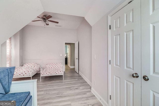 95 Jeffco Dr, Jefferson, GA 30549 - bedroom featuring light wood-style flooring, lofted ceiling, and a ceiling fan