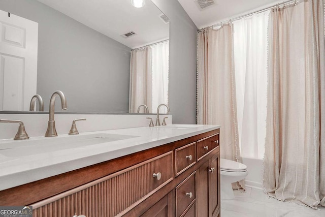 95 Jeffco Dr, Jefferson, GA 30549 - bathroom featuring double vanity, shower / bath combo with shower curtain, marble finish flooring, and plenty of natural light