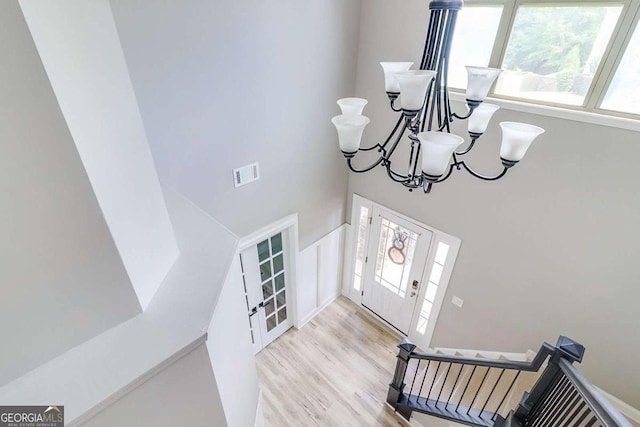 95 Jeffco Dr, Jefferson, GA 30549 - foyer with a chandelier, a high ceiling, light wood finished floors, and french doors