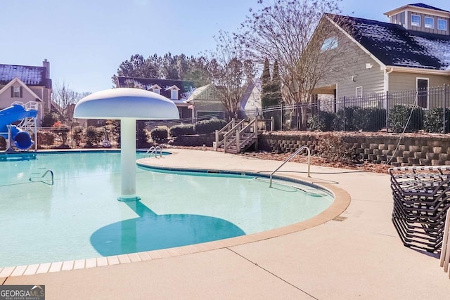 95 Jeffco Dr, Jefferson, GA 30549 - community pool featuring a water slide and a patio area