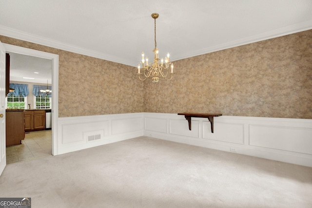 4313 Deep Springs Ct NW, Kennesaw, GA 30144 - spare room featuring a chandelier, light carpet, a wainscoted wall, ornamental molding, and a decorative wall
