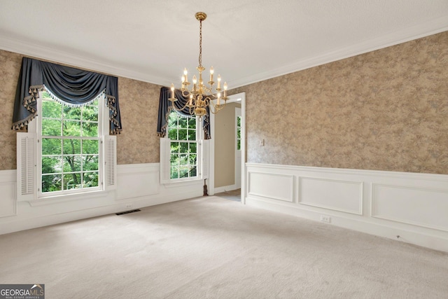 4313 Deep Springs Ct NW, Kennesaw, GA 30144 - unfurnished dining area featuring a chandelier, wainscoting, carpet, ornamental molding, and wallpapered walls