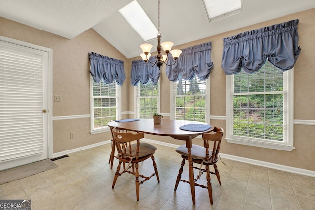 4313 Deep Springs Ct NW, Kennesaw, GA 30144 - dining room with vaulted ceiling and a chandelier