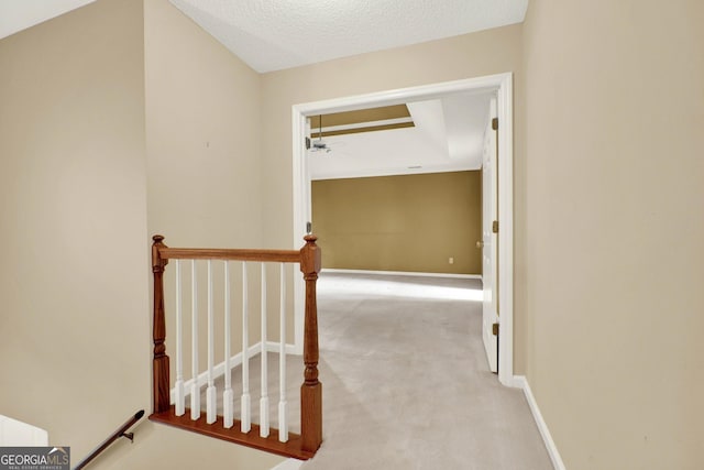 4313 Deep Springs Ct NW, Kennesaw, GA 30144 - hall featuring an upstairs landing, carpet flooring, and a textured ceiling