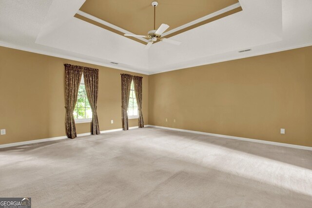 4313 Deep Springs Ct NW, Kennesaw, GA 30144 - carpeted spare room featuring a tray ceiling, ceiling fan, and crown molding