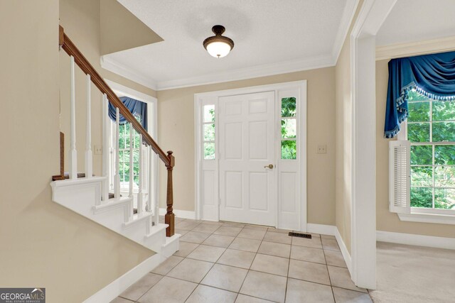 4313 Deep Springs Ct NW, Kennesaw, GA 30144 - entrance foyer featuring stairs, light tile patterned floors, and crown molding