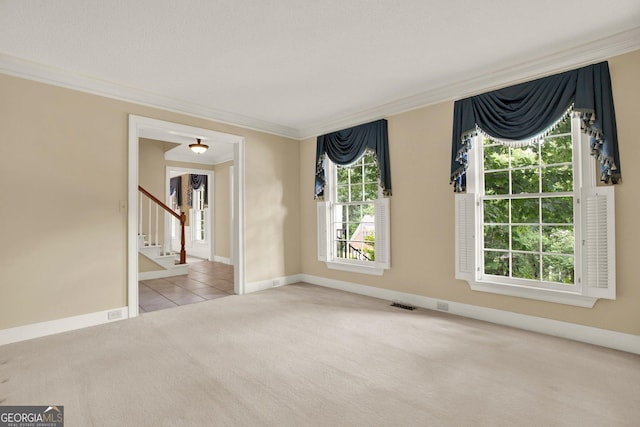 4313 Deep Springs Ct NW, Kennesaw, GA 30144 - carpeted empty room with crown molding, stairs, and tile patterned flooring