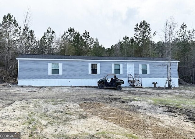 1667 Richard Moore Rd, Dublin, GA 31021 - view of front of property with view of wooded area