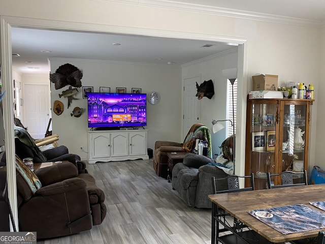 1667 Richard Moore Rd, Dublin, GA 31021 - living room featuring wood finished floors and crown molding