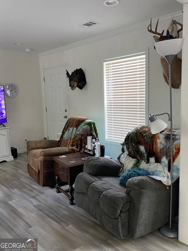 1667 Richard Moore Rd, Dublin, GA 31021 - living room with crown molding and wood finished floors